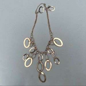 Gold colored necklace and earring set